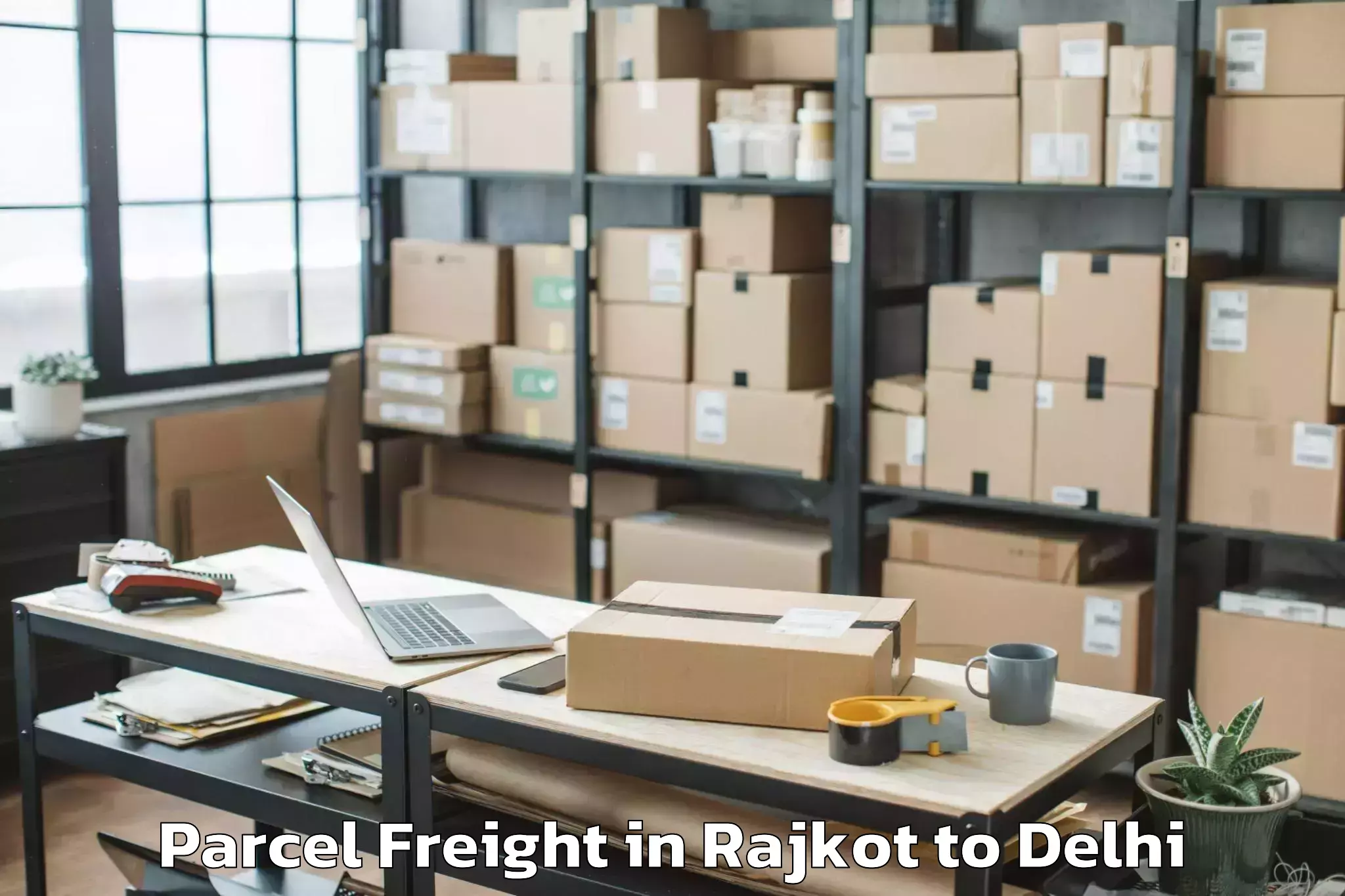 Book Rajkot to D Mall Rohini Parcel Freight Online